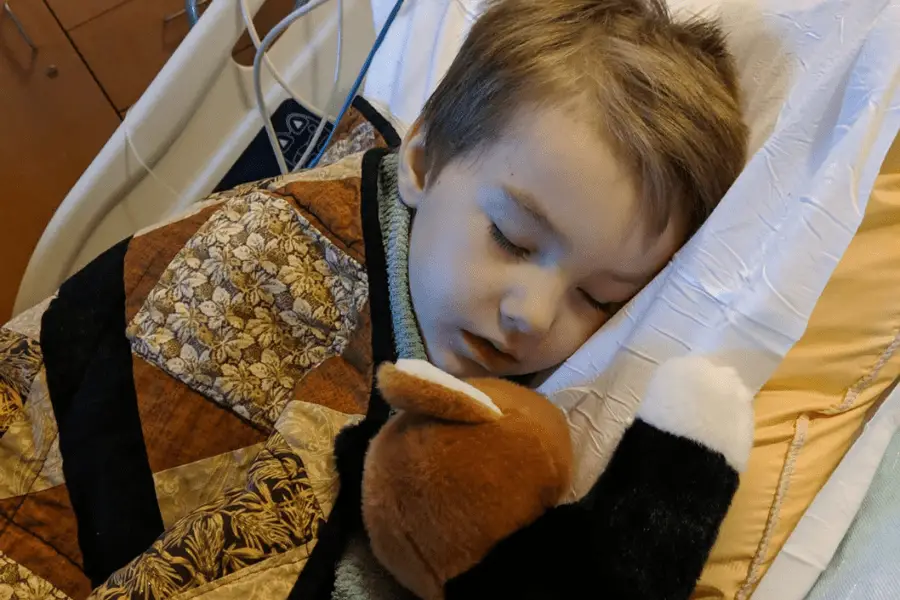 Childhood Cancer Prevention. Young boy post surgery