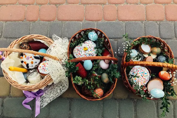 Easter baskets on a curb filled with eco-friendly easter egg fillers