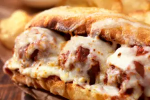Excellent for using leftover meatballs, meatball subs are affordable and easy to whip up making them a must for your list of large family dinner ideas.